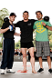 SAO PAULO, BRAZIL - JANUARY 16:  C.B. Dolloway (center) poses for photos with his team after an open workout session for media and fans on January 16, 2013 at Parque Anhangabau in Sao Paulo, Brazil. (Photo by Josh Hedges/Zuffa LLC/Zuffa LLC via Getty Images)