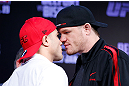 SAO PAULO, BRAZIL - JANUARY 17:  (L-R) Opponents Daniel Sarafian and C.B. Dolloway face off during a UFC press conference on January 17, 2013 at the Hilton Hotel in Sao Paulo, Brazil. (Photo by Josh Hedges/Zuffa LLC/Zuffa LLC via Getty Images)