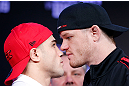 SAO PAULO, BRAZIL - JANUARY 17:  (L-R) Opponents Daniel Sarafian and C.B. Dolloway face off during a UFC press conference on January 17, 2013 at the Hilton Hotel in Sao Paulo, Brazil. (Photo by Josh Hedges/Zuffa LLC/Zuffa LLC via Getty Images)
