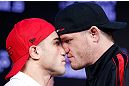 SAO PAULO, BRAZIL - JANUARY 17:  (L-R) Opponents Daniel Sarafian and C.B. Dolloway face off during a UFC press conference on January 17, 2013 at the Hilton Hotel in Sao Paulo, Brazil. (Photo by Josh Hedges/Zuffa LLC/Zuffa LLC via Getty Images)
