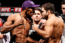 SAO PAULO, BRAZIL - JANUARY 18:  (L-R) Opponents Yuri Alcantara and Pedro Nobre face off during the UFC on FX official weigh-in event on January 18, 2013 at Ibirapuera Gymnasium in Sao Paulo, Brazil. (Photo by Josh Hedges/Zuffa LLC/Zuffa LLC via Getty Images)