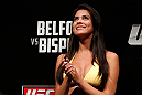 SAO PAULO, BRAZIL - JANUARY 18:  UFC Octagon Girl Camila Rodrigues de Oliveira stands on stage during the UFC on FX official weigh-in event on January 18, 2013 at Ibirapuera Gymnasium in Sao Paulo, Brazil. (Photo by Josh Hedges/Zuffa LLC/Zuffa LLC via Getty Images)