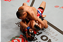 SAO PAULO, BRAZIL - JANUARY 19:  Francisco Trinaldo (top) punches C.J. Keith in their lightweight fight at the UFC on FX event on January 19, 2013 at Ibirapuera Gymnasium in Sao Paulo, Brazil. (Photo by Josh Hedges/Zuffa LLC/Zuffa LLC via Getty Images)