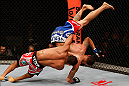 SAO PAULO, BRAZIL - JANUARY 19:  (L-R) Francisco Trinaldo slams C.J. Keith in their lightweight fight at the UFC on FX event on January 19, 2013 at Ibirapuera Gymnasium in Sao Paulo, Brazil. (Photo by Josh Hedges/Zuffa LLC/Zuffa LLC via Getty Images)