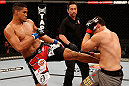 SAO PAULO, BRAZIL - JANUARY 19:  (L-R) Ildemar Alcantara kicks Wagner Prado in their light heavyweight fight at the UFC on FX event on January 19, 2013 at Ibirapuera Gymnasium in Sao Paulo, Brazil. (Photo by Josh Hedges/Zuffa LLC/Zuffa LLC via Getty Images)