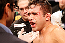 SAO PAULO, BRAZIL - JANUARY 19:  Pedro Nobre is treated by doctors after an illegal strike from Yuri Alcantara in their bantamweight fight at the UFC on FX event on January 19, 2013 at Ibirapuera Gymnasium in Sao Paulo, Brazil. (Photo by Josh Hedges/Zuffa LLC/Zuffa LLC via Getty Images)