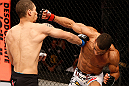 SAO PAULO, BRAZIL - JANUARY 19:  (R-L) Edson Barboza punches Lucas Martins in their lightweight fight at the UFC on FX event on January 19, 2013 at Ibirapuera Gymnasium in Sao Paulo, Brazil. (Photo by Josh Hedges/Zuffa LLC/Zuffa LLC via Getty Images)
