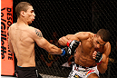 SAO PAULO, BRAZIL - JANUARY 19:  (R-L) Edson Barboza punches Lucas Martins in their lightweight fight at the UFC on FX event on January 19, 2013 at Ibirapuera Gymnasium in Sao Paulo, Brazil. (Photo by Josh Hedges/Zuffa LLC/Zuffa LLC via Getty Images)