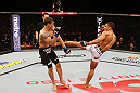 SAO PAULO, BRAZIL - JANUARY 19:  (R-L) Edson Barboza kicks Lucas Martins in their lightweight fight at the UFC on FX event on January 19, 2013 at Ibirapuera Gymnasium in Sao Paulo, Brazil. (Photo by Josh Hedges/Zuffa LLC/Zuffa LLC via Getty Images)
