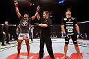 SAO PAULO, BRAZIL - JANUARY 19:  Edson Barboza (L) reacts after knocking out Lucas Martins in their lightweight fight at the UFC on FX event on January 19, 2013 at Ibirapuera Gymnasium in Sao Paulo, Brazil. (Photo by Josh Hedges/Zuffa LLC/Zuffa LLC via Getty Images)
