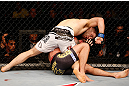 SAO PAULO, BRAZIL - JANUARY 19:  Nik Lentz (white shorts) punches Diego Nunes in their featherweight fight at the UFC on FX event on January 19, 2013 at Ibirapuera Gymnasium in Sao Paulo, Brazil. (Photo by Josh Hedges/Zuffa LLC/Zuffa LLC via Getty Images)