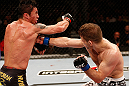 SAO PAULO, BRAZIL - JANUARY 19:  (R-L) Nik Lentz and Diego Nunes trade punches in their featherweight fight at the UFC on FX event on January 19, 2013 at Ibirapuera Gymnasium in Sao Paulo, Brazil. (Photo by Josh Hedges/Zuffa LLC/Zuffa LLC via Getty Images)