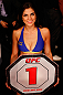 SAO PAULO, BRAZIL - JANUARY 19:  UFC Octagon Girl Aline Caroline Franzoi prepares to introduce a round during the UFC on FX event on January 19, 2013 at Ibirapuera Gymnasium in Sao Paulo, Brazil. (Photo by Josh Hedges/Zuffa LLC/Zuffa LLC via Getty Images)