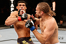 SAO PAULO, BRAZIL - JANUARY 19:  (R-L) Andrew Craig punches Ronny Markes in their middleweight fight at the UFC on FX event on January 19, 2013 at Ibirapuera Gymnasium in Sao Paulo, Brazil. (Photo by Josh Hedges/Zuffa LLC/Zuffa LLC via Getty Images)