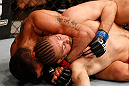 SAO PAULO, BRAZIL - JANUARY 19:  (L-R) Ronny Markes attempts a rear choke submission against Andrew Craig in their middleweight fight at the UFC on FX event on January 19, 2013 at Ibirapuera Gymnasium in Sao Paulo, Brazil. (Photo by Josh Hedges/Zuffa LLC/Zuffa LLC via Getty Images)