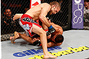 SAO PAULO, BRAZIL - JANUARY 19:  (L-R) Andrew Craig punches Ronny Markes in their middleweight fight at the UFC on FX event on January 19, 2013 at Ibirapuera Gymnasium in Sao Paulo, Brazil. (Photo by Josh Hedges/Zuffa LLC/Zuffa LLC via Getty Images)