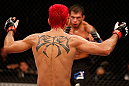 SAO PAULO, BRAZIL - JANUARY 19:  (L-R) Godofredo "Pepey" Castro taunts Milton Vieira in their featherweight fight at the UFC on FX event on January 19, 2013 at Ibirapuera Gymnasium in Sao Paulo, Brazil. (Photo by Josh Hedges/Zuffa LLC/Zuffa LLC via Getty Images)