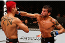 SAO PAULO, BRAZIL - JANUARY 19:  (R-L) Milton Vieira punches Godofredo "Pepey" Castro in their featherweight fight at the UFC on FX event on January 19, 2013 at Ibirapuera Gymnasium in Sao Paulo, Brazil. (Photo by Josh Hedges/Zuffa LLC/Zuffa LLC via Getty Images)