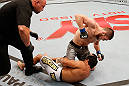 SAO PAULO, BRAZIL - JANUARY 19:  Khabib Nurmagomedov (top) punches Thiago Tavares in their lightweight fight at the UFC on FX event on January 19, 2013 at Ibirapuera Gymnasium in Sao Paulo, Brazil. (Photo by Josh Hedges/Zuffa LLC/Zuffa LLC via Getty Images)
