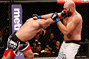 SAO PAULO, BRAZIL - JANUARY 19:  (L-R) Gabriel Gonzaga punches Ben Rothwell  in their heavyweight fight at the UFC on FX event on January 19, 2013 at Ibirapuera Gymnasium in Sao Paulo, Brazil. (Photo by Josh Hedges/Zuffa LLC/Zuffa LLC via Getty Images)