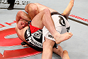 SAO PAULO, BRAZIL - JANUARY 19:  (L-R) Gabriel Gonzaga secures a guillotine choke submission against Ben Rothwell in their heavyweight fight at the UFC on FX event on January 19, 2013 at Ibirapuera Gymnasium in Sao Paulo, Brazil. (Photo by Josh Hedges/Zuffa LLC/Zuffa LLC via Getty Images)