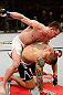SAO PAULO, BRAZIL - JANUARY 19:  (L-R) C.B. Dolloway punches Daniel Sarafian in their middleweight fight at the UFC on FX event on January 19, 2013 at Ibirapuera Gymnasium in Sao Paulo, Brazil. (Photo by Josh Hedges/Zuffa LLC/Zuffa LLC via Getty Images)