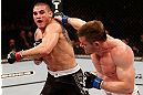 SAO PAULO, BRAZIL - JANUARY 19:  (R-L) C.B. Dolloway punches Daniel Sarafian in their middleweight fight at the UFC on FX event on January 19, 2013 at Ibirapuera Gymnasium in Sao Paulo, Brazil. (Photo by Josh Hedges/Zuffa LLC/Zuffa LLC via Getty Images)