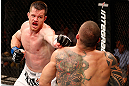 SAO PAULO, BRAZIL - JANUARY 19:  (L-R) C.B. Dolloway punches Daniel Sarafian in their middleweight fight at the UFC on FX event on January 19, 2013 at Ibirapuera Gymnasium in Sao Paulo, Brazil. (Photo by Josh Hedges/Zuffa LLC/Zuffa LLC via Getty Images)