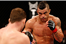 SAO PAULO, BRAZIL - JANUARY 19:  (R-L) Vitor Belfort squares off with Michael Bisping in their middleweight fight at the UFC on FX event on January 19, 2013 at Ibirapuera Gymnasium in Sao Paulo, Brazil. (Photo by Josh Hedges/Zuffa LLC/Zuffa LLC via Getty Images)