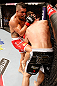 SAO PAULO, BRAZIL - JANUARY 19:  (L-R) Vitor Belfort knees Michael Bisping in their middleweight fight at the UFC on FX event on January 19, 2013 at Ibirapuera Gymnasium in Sao Paulo, Brazil. (Photo by Josh Hedges/Zuffa LLC/Zuffa LLC via Getty Images)