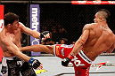 SAO PAULO, BRAZIL - JANUARY 19:  (R-L) Vitor Belfort kicks Michael Bisping in their middleweight fight at the UFC on FX event on January 19, 2013 at Ibirapuera Gymnasium in Sao Paulo, Brazil. (Photo by Josh Hedges/Zuffa LLC/Zuffa LLC via Getty Images)