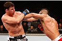 SAO PAULO, BRAZIL - JANUARY 19:  (R-L) Vitor Belfort punches Michael Bisping in their middleweight fight at the UFC on FX event on January 19, 2013 at Ibirapuera Gymnasium in Sao Paulo, Brazil. (Photo by Josh Hedges/Zuffa LLC/Zuffa LLC via Getty Images)
