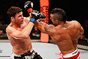SAO PAULO, BRAZIL - JANUARY 19:  (R-L) Vitor Belfort punches Michael Bisping in their middleweight fight at the UFC on FX event on January 19, 2013 at Ibirapuera Gymnasium in Sao Paulo, Brazil. (Photo by Josh Hedges/Zuffa LLC/Zuffa LLC via Getty Images)
