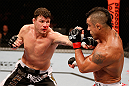 SAO PAULO, BRAZIL - JANUARY 19:  (L-R) Michael Bisping punches Vitor Belfort in their middleweight fight at the UFC on FX event on January 19, 2013 at Ibirapuera Gymnasium in Sao Paulo, Brazil. (Photo by Josh Hedges/Zuffa LLC/Zuffa LLC via Getty Images)