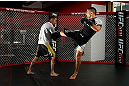 CHICAGO, IL - JANUARY 23:  Ricardo Lamas (R) conducts an open workout session for media on January 23, 2013 at UFC Gym in Chicago, Illinois. (Photo by Josh Hedges/Zuffa LLC/Zuffa LLC via Getty Images)