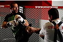 CHICAGO, IL - JANUARY 23:  Donald "Cowboy" Cerrone (L) conducts an open workout session for media on January 23, 2013 at UFC Gym in Chicago, Illinois. (Photo by Josh Hedges/Zuffa LLC/Zuffa LLC via Getty Images)