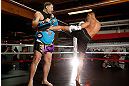 CHICAGO, IL - JANUARY 23:  Anthony Pettis (R) conducts an open workout session for media on January 23, 2013 at UFC Gym in Chicago, Illinois. (Photo by Josh Hedges/Zuffa LLC/Zuffa LLC via Getty Images)
