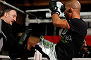 CHICAGO, IL - JANUARY 23:  Demetrious "Mighty Mouse" Johnson (R) conducts an open workout session for media on January 23, 2013 at UFC Gym in Chicago, Illinois. (Photo by Josh Hedges/Zuffa LLC/Zuffa LLC via Getty Images)