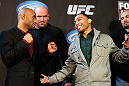CHICAGO, IL - JANUARY 24:  (L-R) Opponents Demetrious "Mighty Mouse" Johnson and John Dodson face off during the UFC on FOX press conference on January 24, 2013 at the United Center in Chicago, Illinois. (Photo by Josh Hedges/Zuffa LLC/Zuffa LLC via Getty Images)