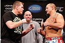 CHICAGO, IL - JANUARY 25:  (L-R) Opponents Mike Russow and Shawn Jordan face off during the UFC on FOX weigh-in on January 25, 2013 at the Chicago Theatre in Chicago, Illinois. (Photo by Josh Hedges/Zuffa LLC/Zuffa LLC via Getty Images)