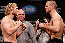 CHICAGO, IL - JANUARY 25:  (L-R) Opponents Mike Stumpf and Pascal Krauss face off during the UFC on FOX weigh-in on January 25, 2013 at the Chicago Theatre in Chicago, Illinois. (Photo by Josh Hedges/Zuffa LLC/Zuffa LLC via Getty Images)