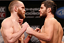 CHICAGO, IL - JANUARY 25:  (L-R) Opponents T.J. Grant and Matt Wiman face off during the UFC on FOX weigh-in on January 25, 2013 at the Chicago Theatre in Chicago, Illinois.  (Photo by Josh Hedges/Zuffa LLC/Zuffa LLC via Getty Images)