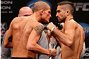 CHICAGO, IL - JANUARY 25:  (L-R) Opponents Erik Koch and Ricardo Lamas face off during the UFC on FOX weigh-in on January 25, 2013 at the Chicago Theatre in Chicago, Illinois. (Photo by Josh Hedges/Zuffa LLC/Zuffa LLC via Getty Images)