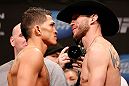 CHICAGO, IL - JANUARY 25:  (L-R) Opponents Anthony Pettis and Donald "Cowboy" Cerrone face off during the UFC on FOX weigh-in on January 25, 2013 at the Chicago Theatre in Chicago, Illinois. (Photo by Josh Hedges/Zuffa LLC/Zuffa LLC via Getty Images)