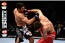 CHICAGO, IL - JANUARY 26:  David Mitchell (L) punches Simeon Thoresen (R) during their Welterweight Bout part of Facebook Prelims at United Center on January 26, 2013 in Chicago, Illinois.  (Photo by Al Bello/Zuffa LLC/Zuffa LLC Via Getty Images)