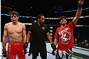 CHICAGO, IL - JANUARY 26:  David Mitchell (R) celebrates after defeating Simeon Thoresen (L) during their Welterweight Bout part of Facebook Prelims at United Center on January 26, 2013 in Chicago, Illinois.  (Photo by Al Bello/Zuffa LLC/Zuffa LLC Via Getty Images)