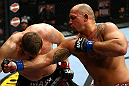 CHICAGO, IL - JANUARY 26:  Shawn Jordan (R) punches Mike Russow (L) during their Heavyweight Bout part of UFC on FOX at United Center on January 26, 2013 in Chicago, Illinois.  (Photo by Al Bello/Zuffa LLC/Zuffa LLC Via Getty Images)