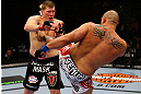 CHICAGO, IL - JANUARY 26:  Shawn Jordan (R) kicks Mike Russow (L) during their Heavyweight Bout part of UFC on FOX at United Center on January 26, 2013 in Chicago, Illinois.  (Photo by Al Bello/Zuffa LLC/Zuffa LLC Via Getty Images)