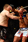 CHICAGO, IL - JANUARY 26:  Shawn Jordan (R) gets punched by Mike Russow (L) during their Heavyweight Bout part of UFC on FOX at United Center on January 26, 2013 in Chicago, Illinois.  (Photo by Josh Hedges/Zuffa LLC/Zuffa LLC Via Getty Images)