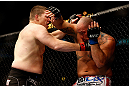CHICAGO, IL - JANUARY 26:  Shawn Jordan (R) gets punched by Mike Russow (L) during their Heavyweight Bout part of UFC on FOX at United Center on January 26, 2013 in Chicago, Illinois.  (Photo by Josh Hedges/Zuffa LLC/Zuffa LLC Via Getty Images)